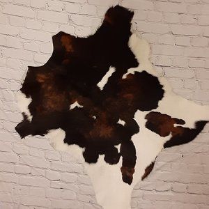 Brazilian Calf Hide Rug - IF IT IS BRAZILIAN WHY DOES IT STILL HAVE HAIR ?!